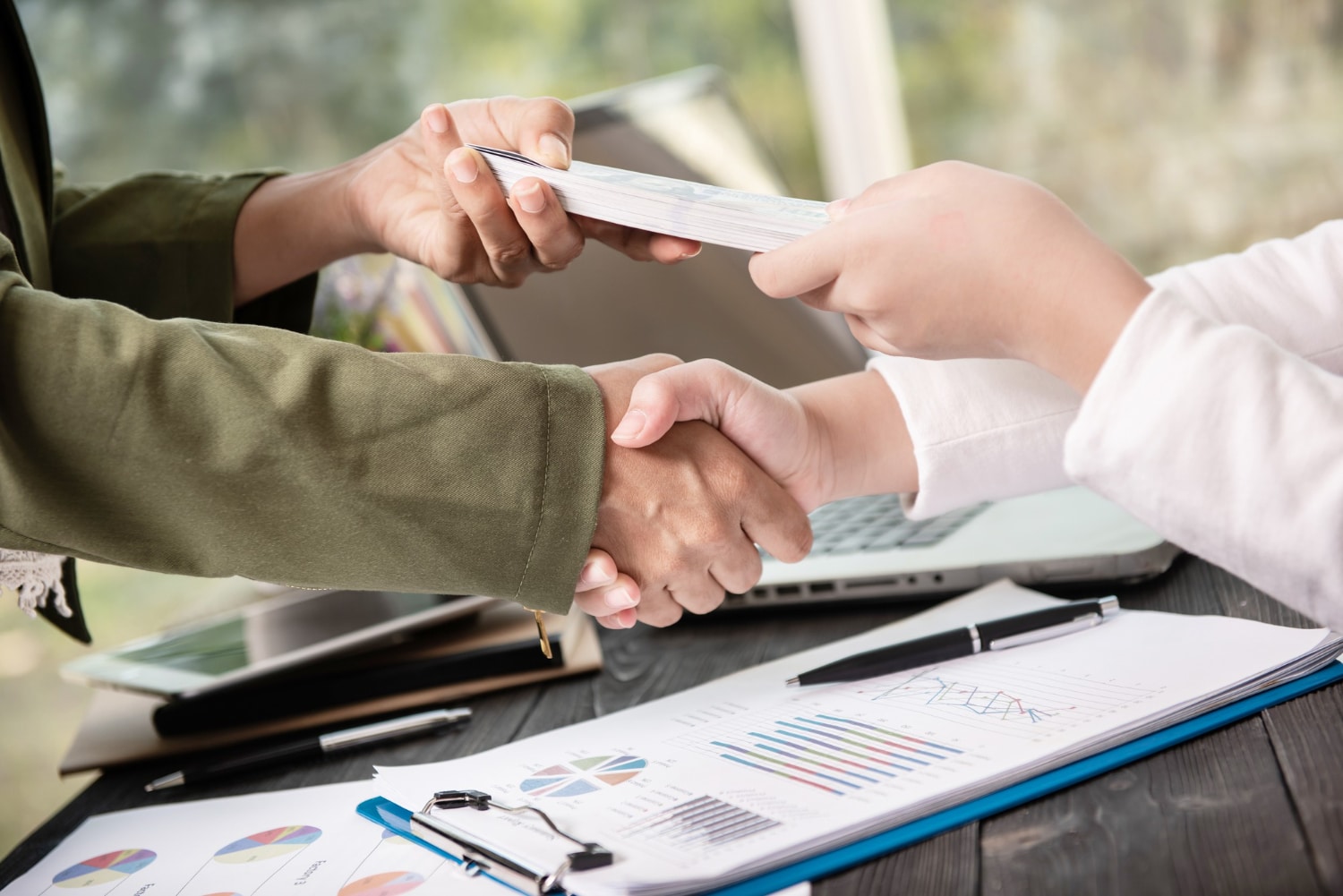 two people discussing financing a project